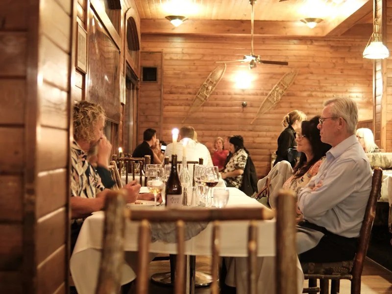 Guests dining at Ducey's, lake side